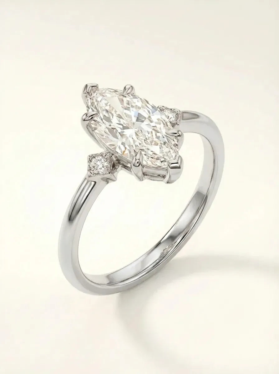 Three-stone ring with 2.00 ct Marquise diamond