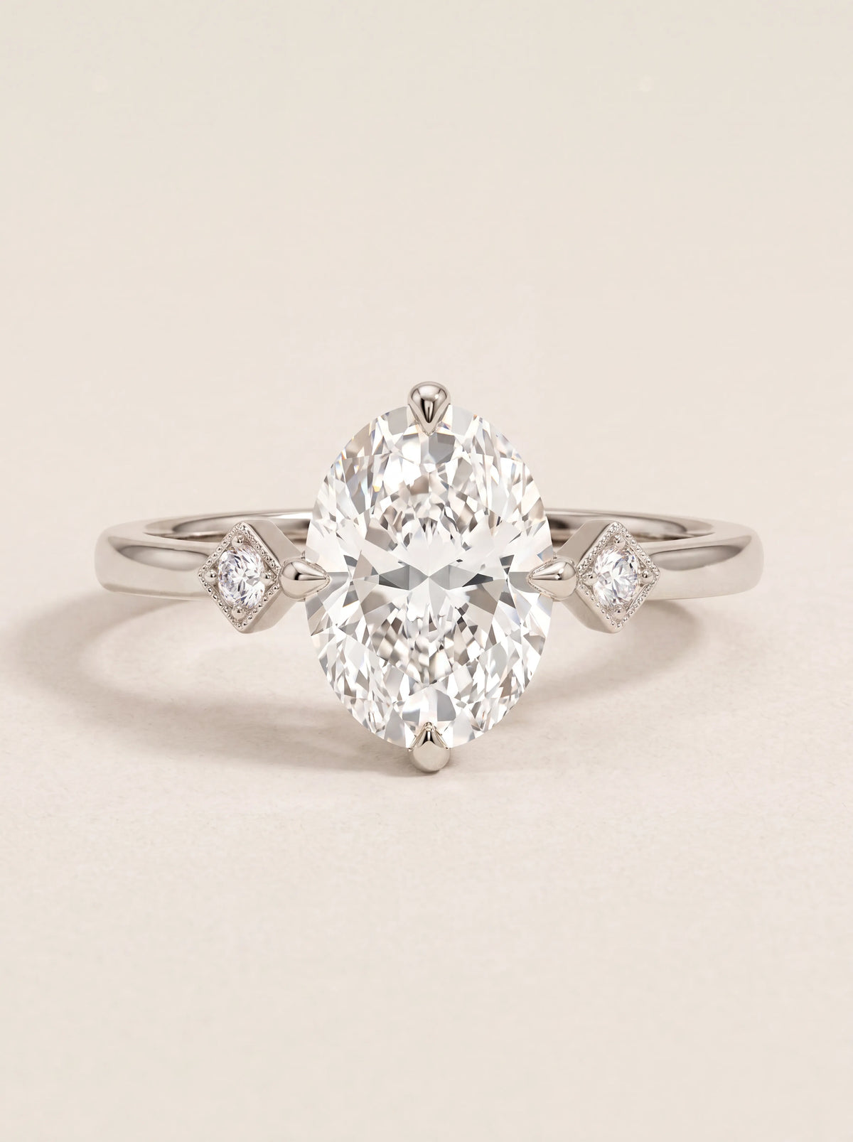 Three-Stone Ring with 2.00 ct Oval Diamond